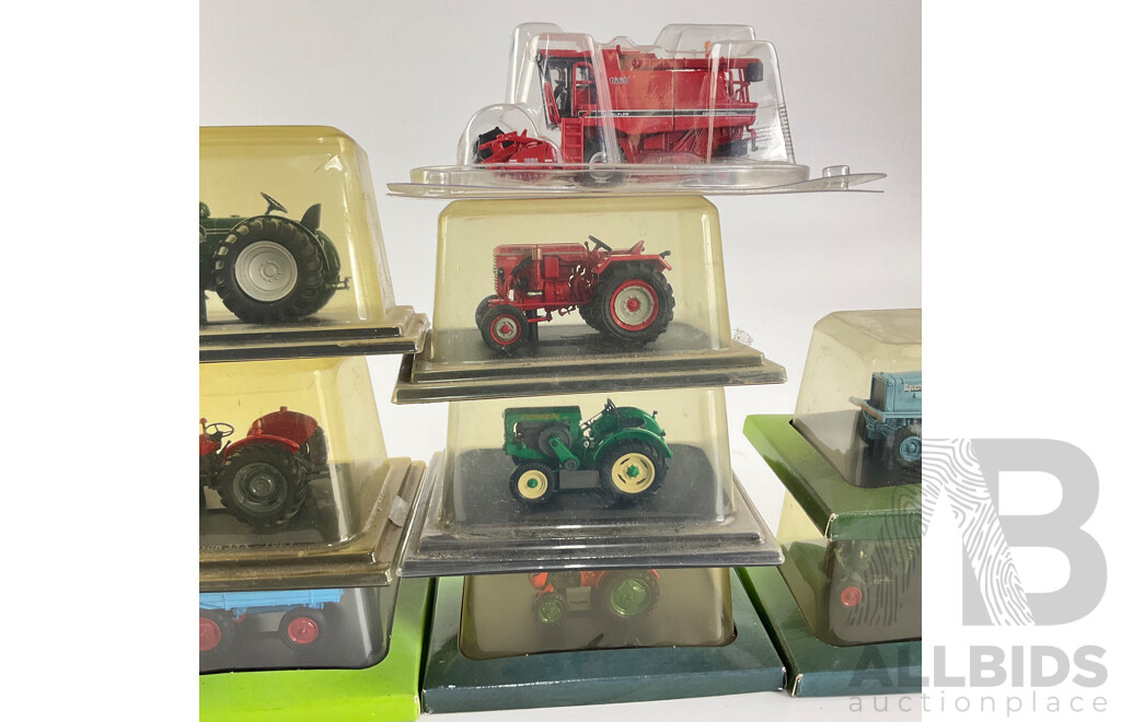 Collection of Cased Diecast Tractors Including Massey Ferguson, Allis-Chalmers, Case International and More