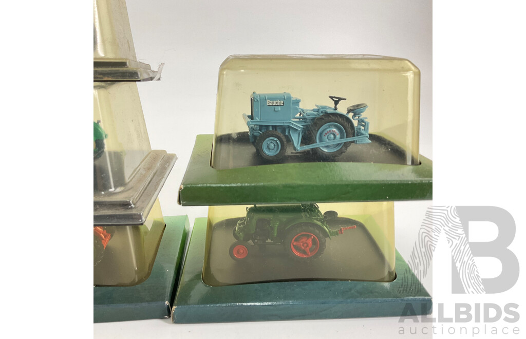 Collection of Cased Diecast Tractors Including Massey Ferguson, Allis-Chalmers, Case International and More