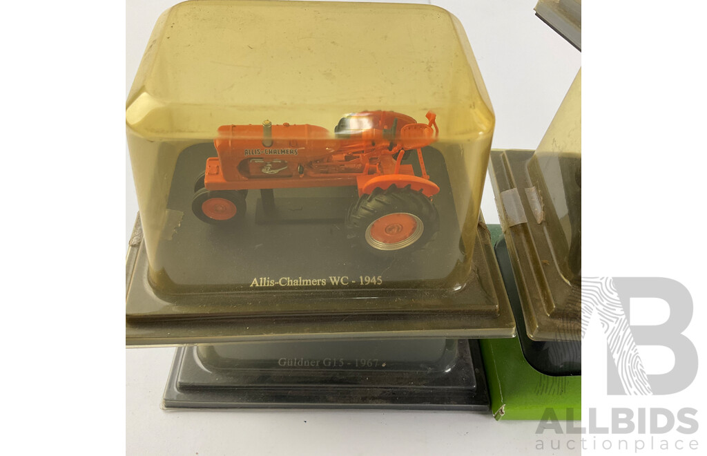 Collection of Cased Diecast Tractors Including Massey Ferguson, Allis-Chalmers, Case International and More