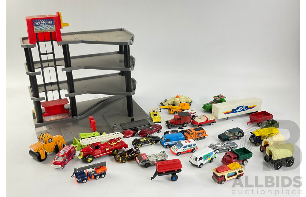 Collection of Diecast Vehicles with Three Level Paking Tower, Includes Matchbox and Hot Wheels