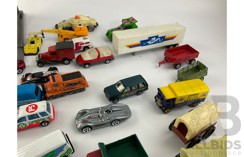 Collection of Diecast Vehicles with Three Level Paking Tower, Includes Matchbox and Hot Wheels