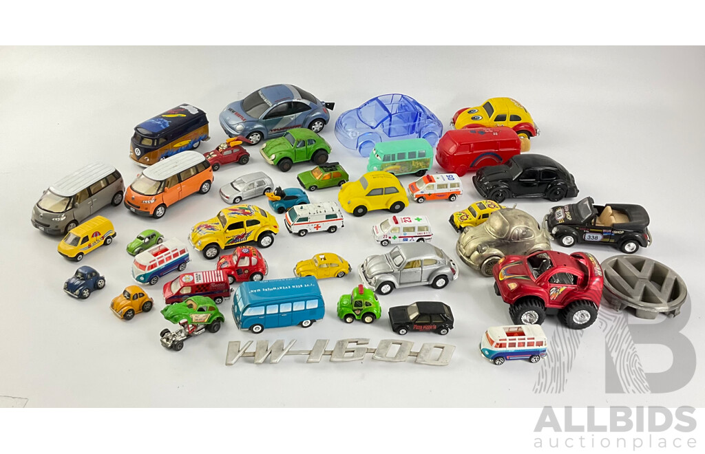 Collection of Diecast and Plastic Volkswagens, Includes Badges Perfume Bottles and Money Bank