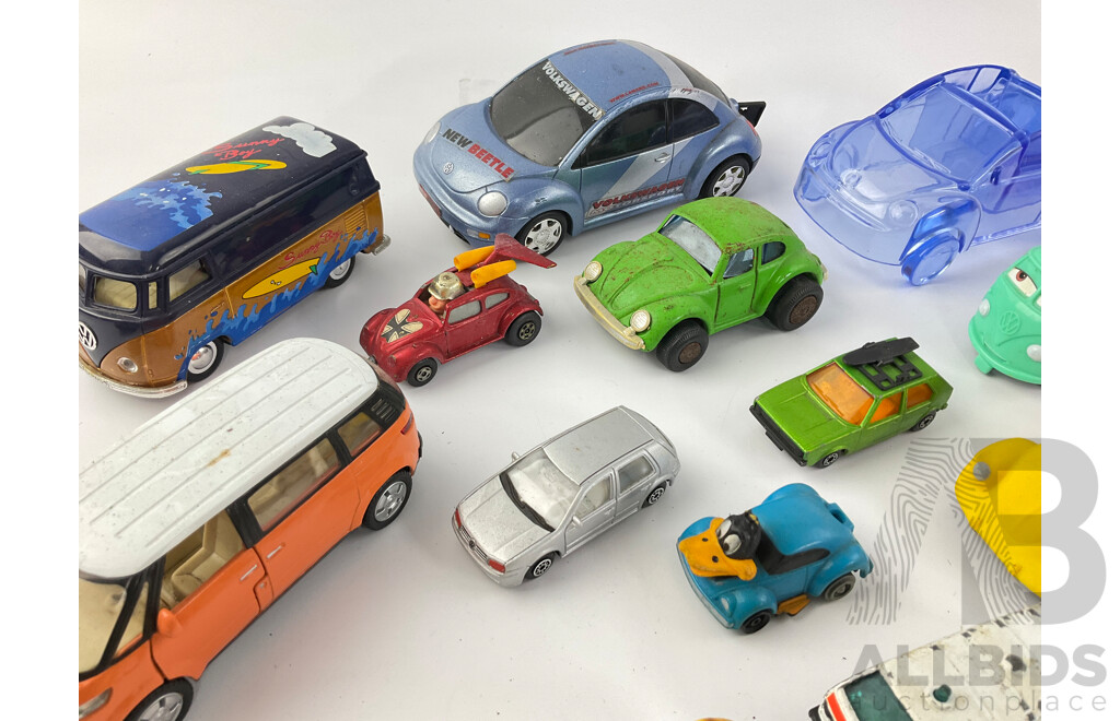 Collection of Diecast and Plastic Volkswagens, Includes Badges Perfume Bottles and Money Bank