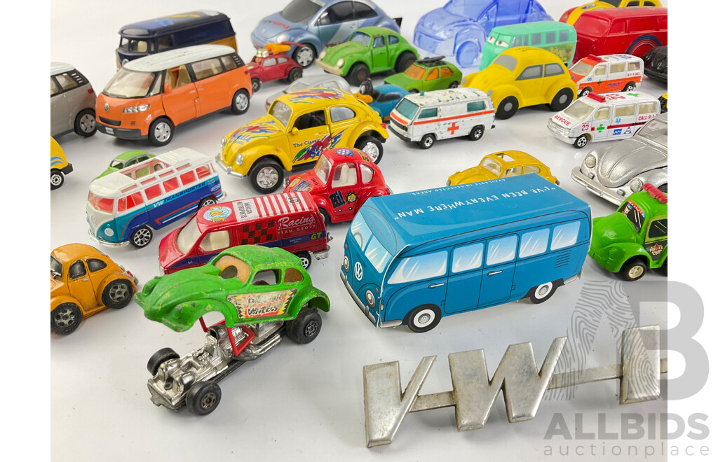 Collection of Diecast and Plastic Volkswagens, Includes Badges Perfume Bottles and Money Bank