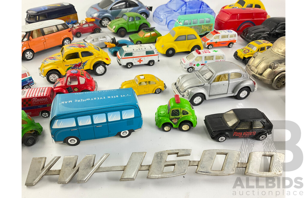 Collection of Diecast and Plastic Volkswagens, Includes Badges Perfume Bottles and Money Bank