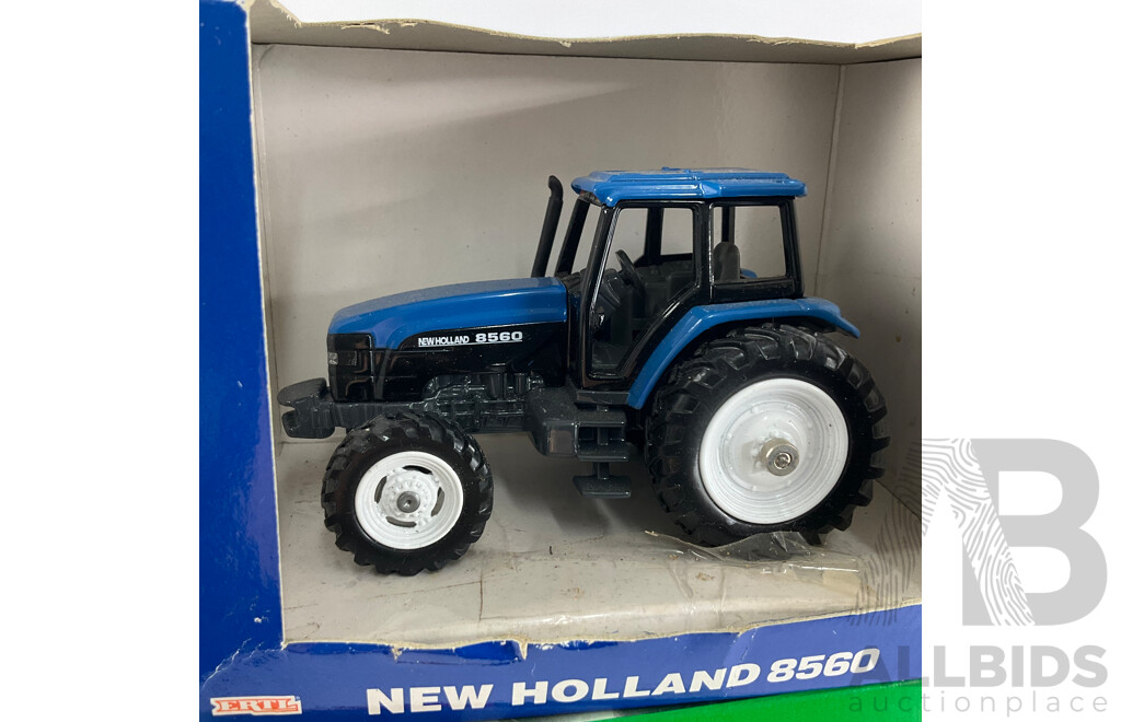 Vintage Diecast Tractors Including Ertl Case International and New Holland 8560 with Siku New Holland 5635