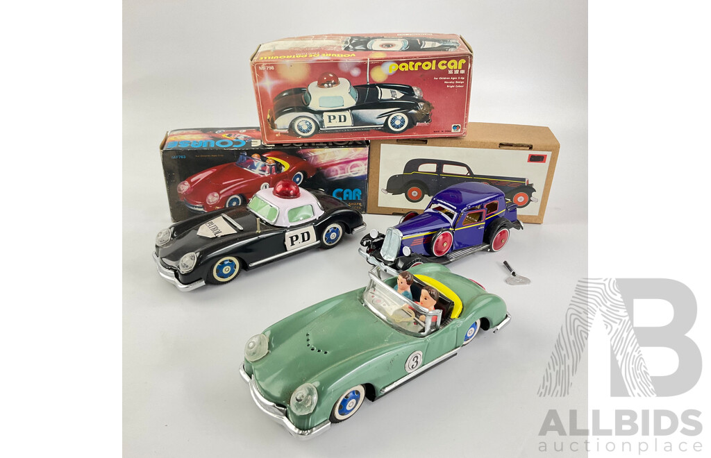 Pressed Steel Clockwork and Friction Drive Cars Including Convertible, Police and Classic Cars with Original Boxes