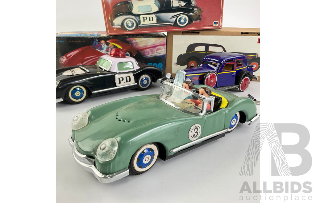 Pressed Steel Clockwork and Friction Drive Cars Including Convertible, Police and Classic Cars with Original Boxes