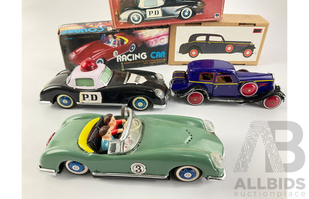 Pressed Steel Clockwork and Friction Drive Cars Including Convertible, Police and Classic Cars with Original Boxes