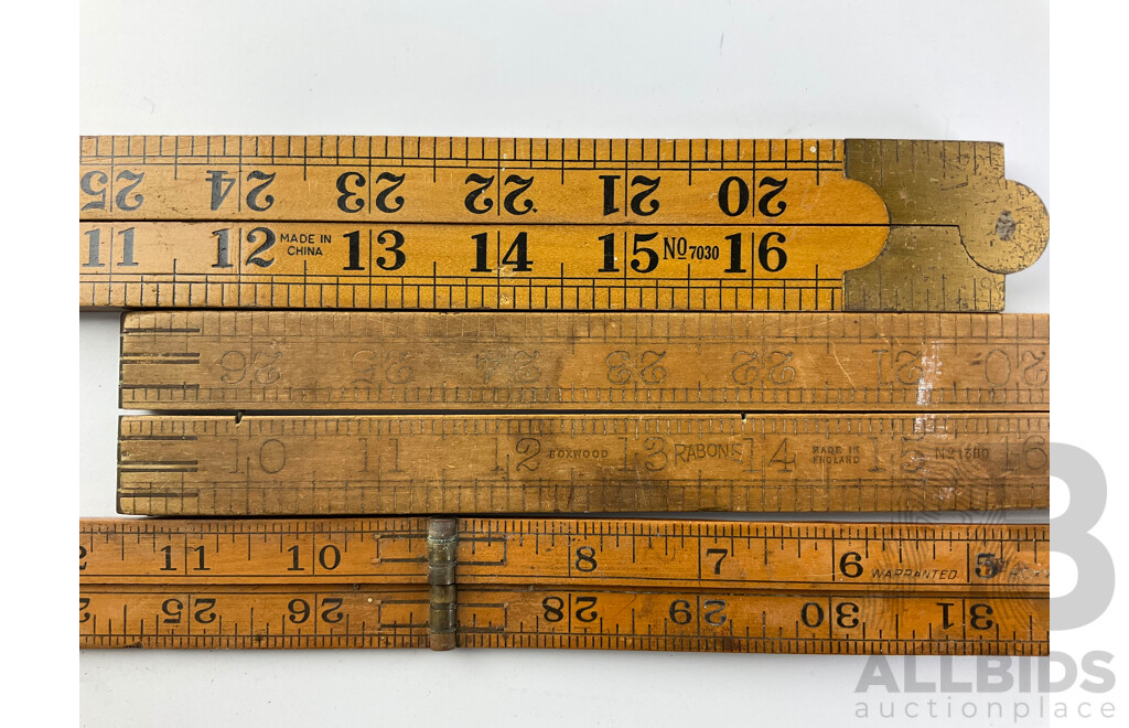 Seven Vintage Folding Timber Rulers Including Five Rabone, Marvule Junior Clamp, United Carr Leather Punch and L.S Starrett Revolution Counter