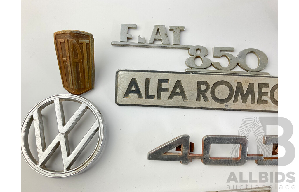 Collection of European Automotive Badges Including Volkswagen, Peugeot, BMW, Renault and Fiat