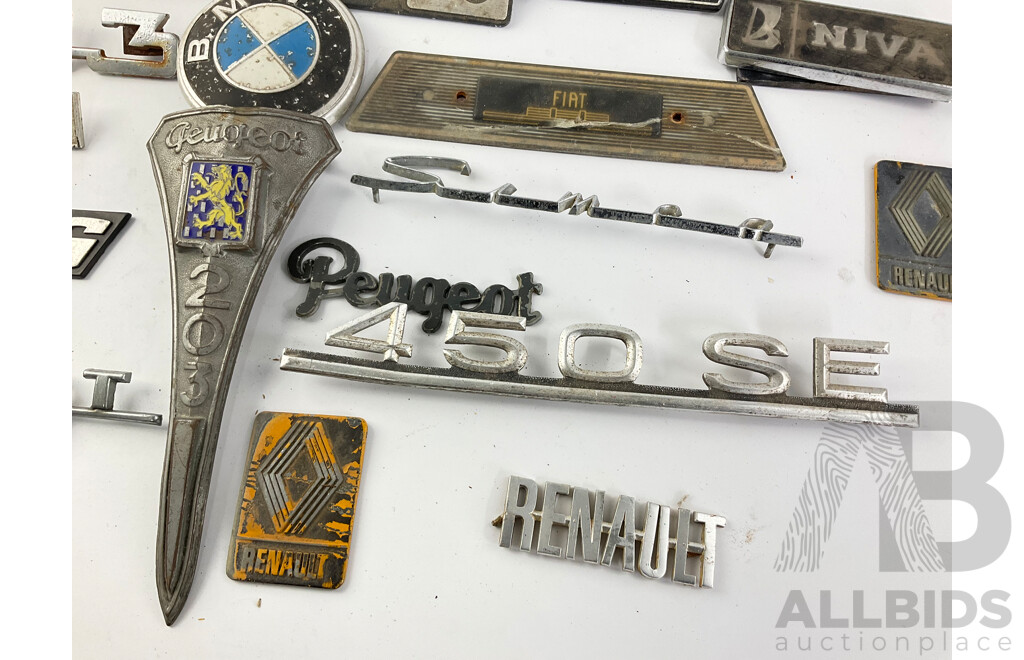 Collection of European Automotive Badges Including Volkswagen, Peugeot, BMW, Renault and Fiat