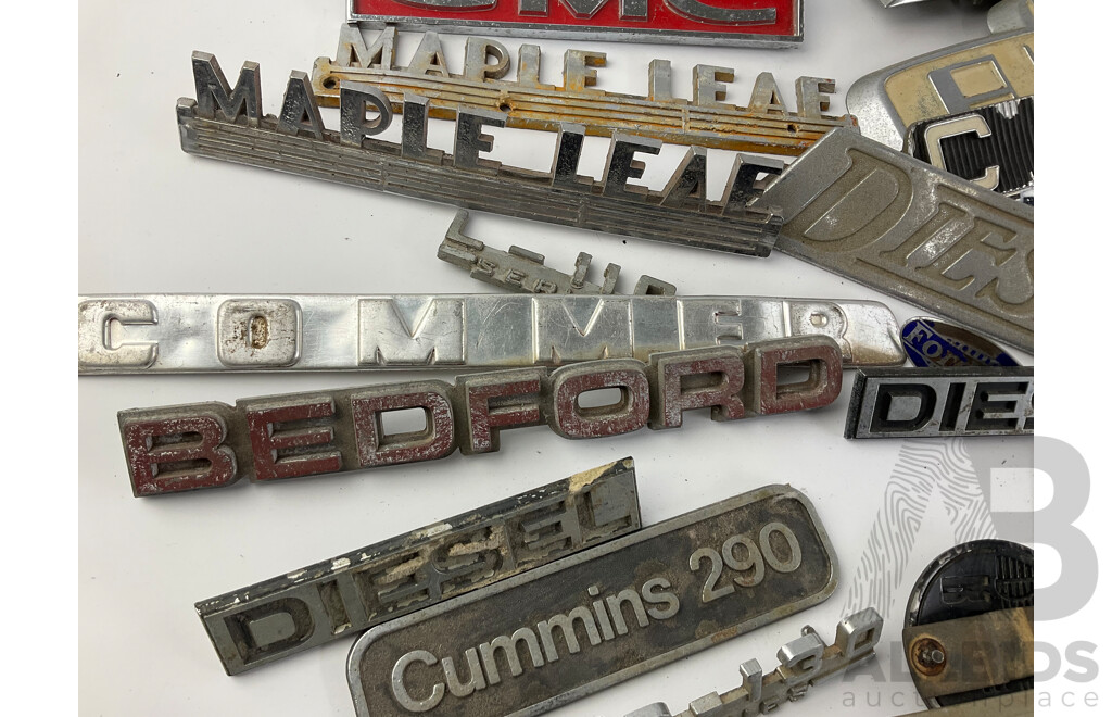 Collection of Vintage Truck Badges Including International, Chevrolet, Ford, GMC, Fordson, Austin, Cummins