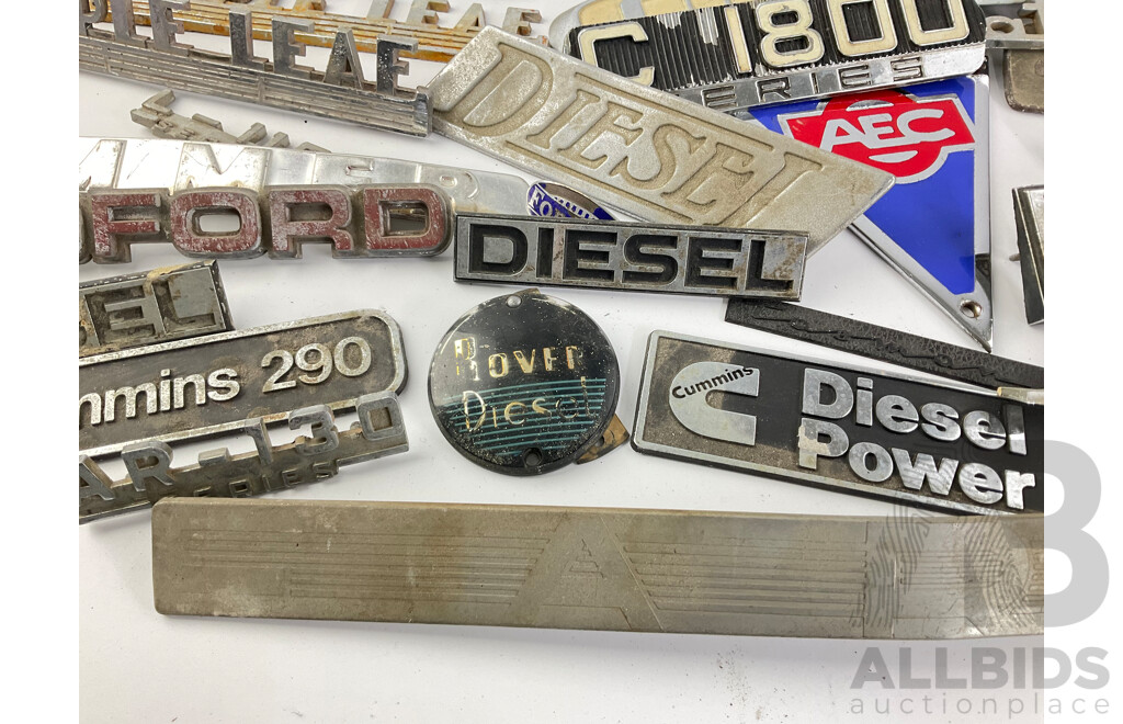 Collection of Vintage Truck Badges Including International, Chevrolet, Ford, GMC, Fordson, Austin, Cummins