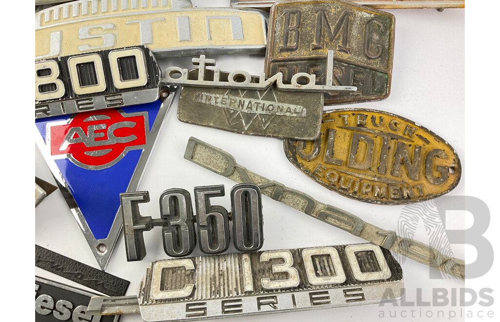 Collection of Vintage Truck Badges Including International, Chevrolet, Ford, GMC, Fordson, Austin, Cummins