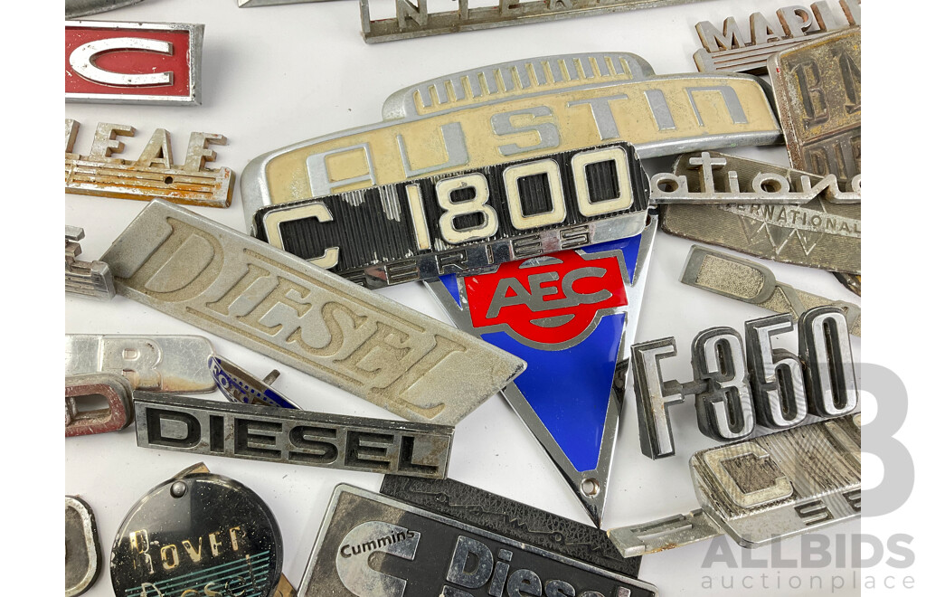 Collection of Vintage Truck Badges Including International, Chevrolet, Ford, GMC, Fordson, Austin, Cummins