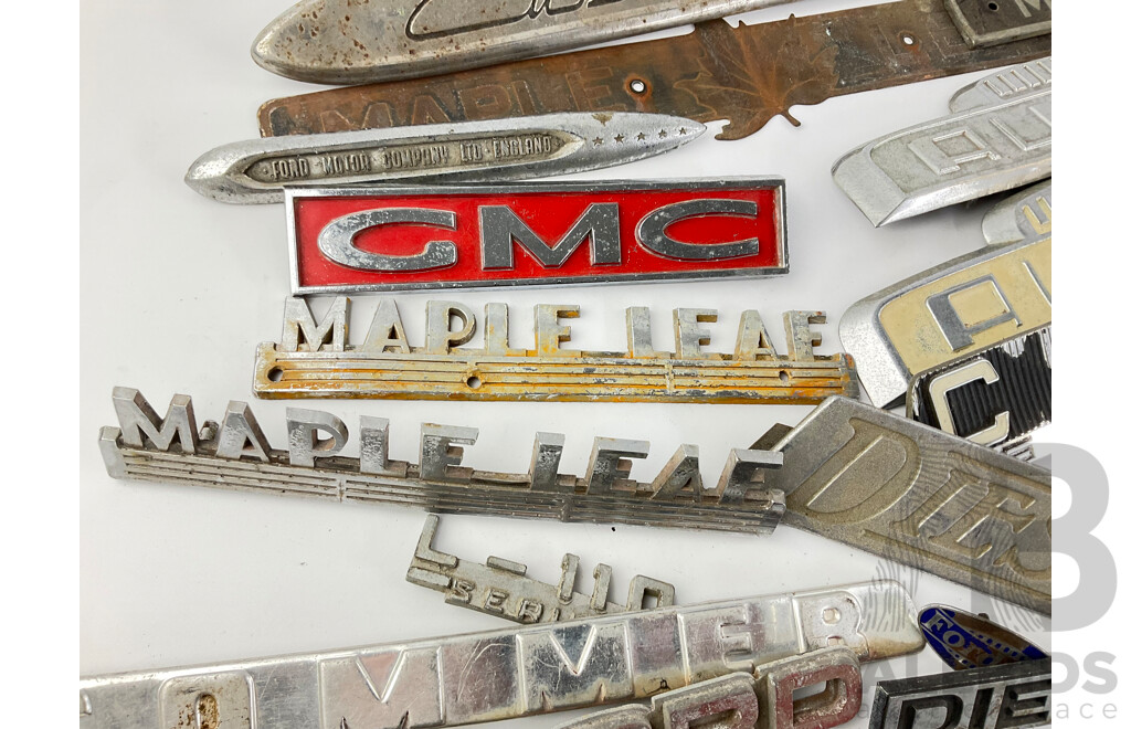 Collection of Vintage Truck Badges Including International, Chevrolet, Ford, GMC, Fordson, Austin, Cummins