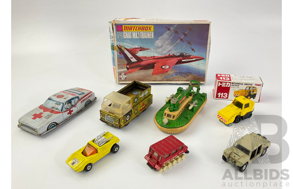 Vintage Diecast Tomica Vehicles Including Mechanical Street Sweeper, Ohara Snow Tiger, Lamborghini Cheetah, Matchbox Gnat MK 1 Trainer, Hover Raider, Poressed Steel Ambulance and Army Truck