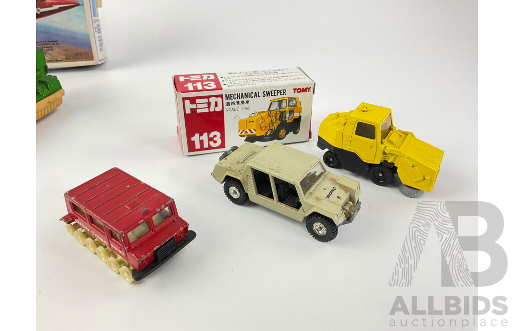 Vintage Diecast Tomica Vehicles Including Mechanical Street Sweeper, Ohara Snow Tiger, Lamborghini Cheetah, Matchbox Gnat MK 1 Trainer, Hover Raider, Poressed Steel Ambulance and Army Truck