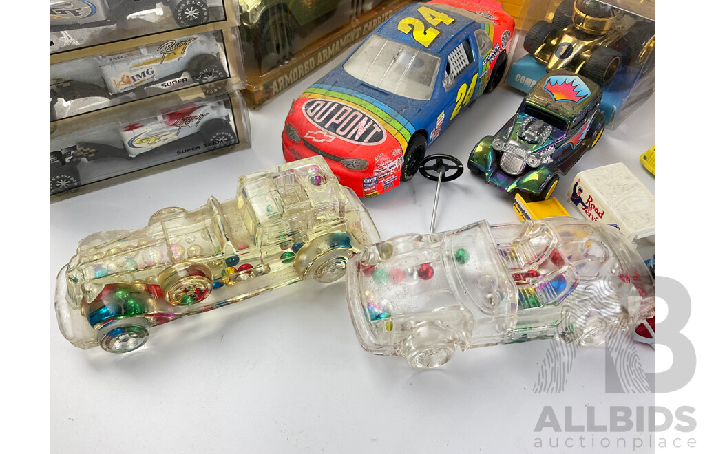 Collection of Diecast and Plastic Vehicles Including Laurel & Hardy Jeep, Formular Ones, Nascar, Hot Wheels Six Car Case and More