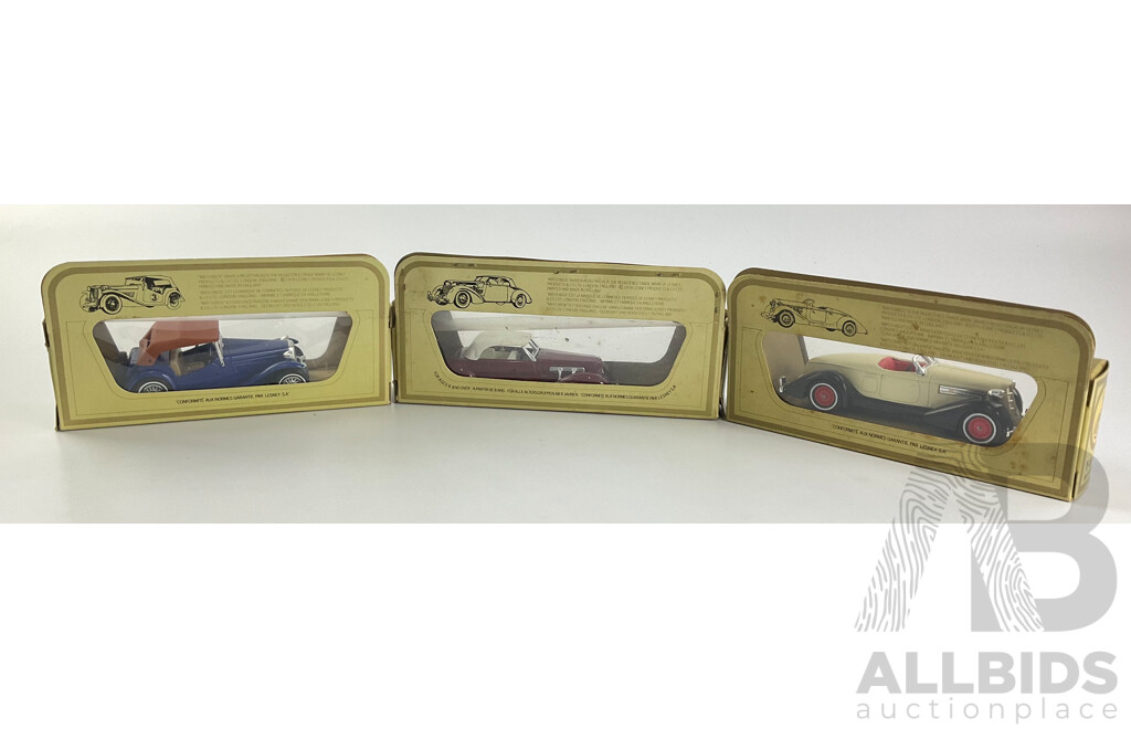 Three Boxed Matchbox Models of Yesteryear Models Including 1945 MG-TC, 1935 Auburn 851, 1937 Cord 812