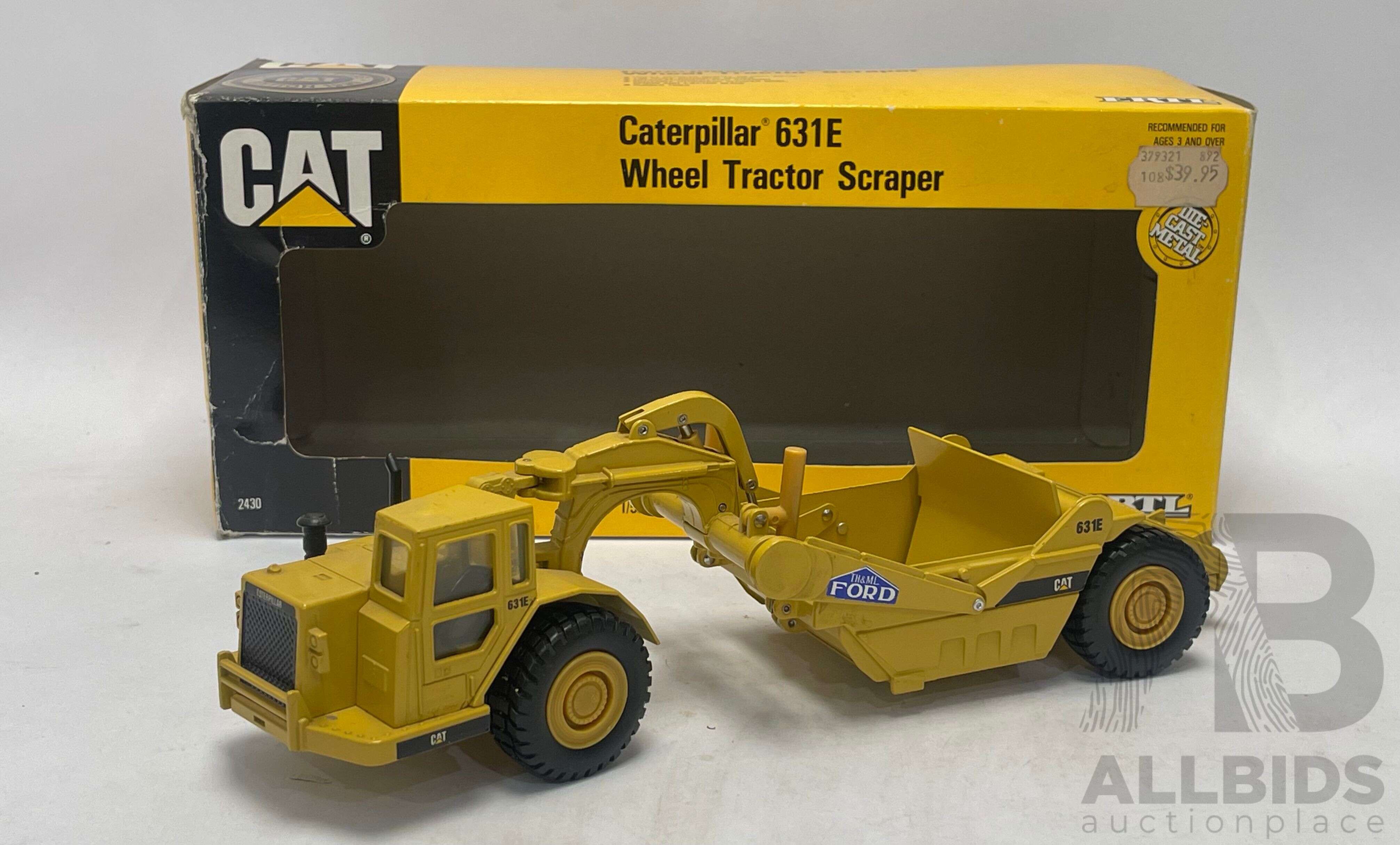 Ertl Caterpillar 631E Wheel Tractor shops Scraper 1:50 Scale