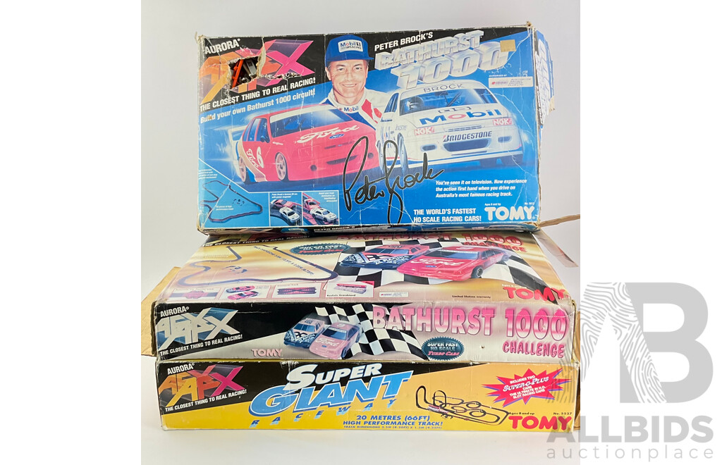 Three Vintage Tomy AFX Slot Car Sets Including Bathurst 1000 Challenge, Peter Brocks Bathurst 1000 and Super Giant Raceway