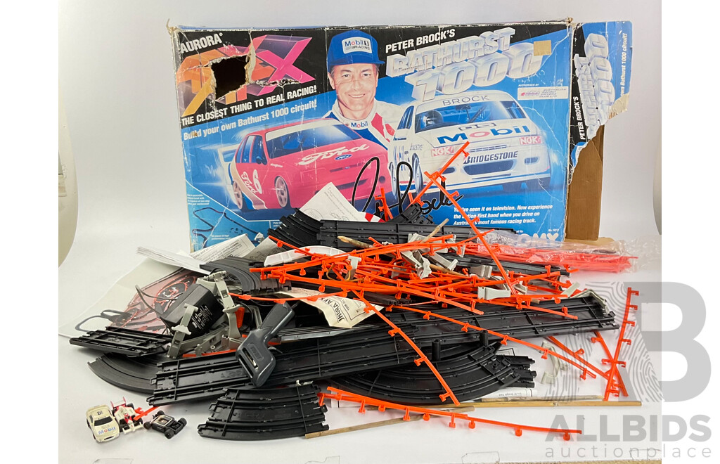 Three Vintage Tomy AFX Slot Car Sets Including Bathurst 1000 Challenge, Peter Brocks Bathurst 1000 and Super Giant Raceway