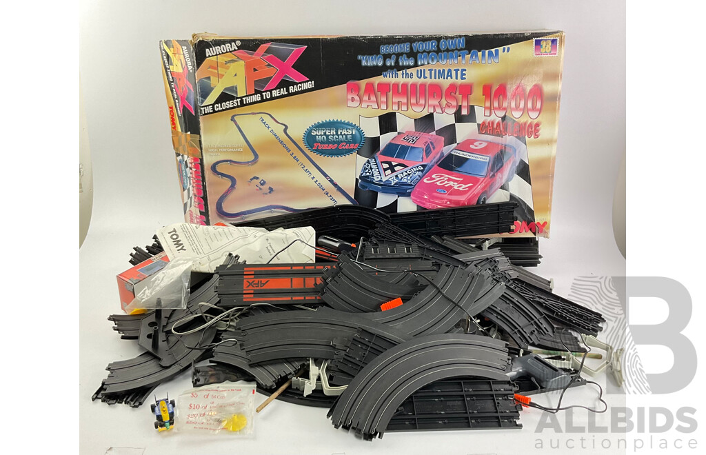 Three Vintage Tomy AFX Slot Car Sets Including Bathurst 1000 Challenge, Peter Brocks Bathurst 1000 and Super Giant Raceway