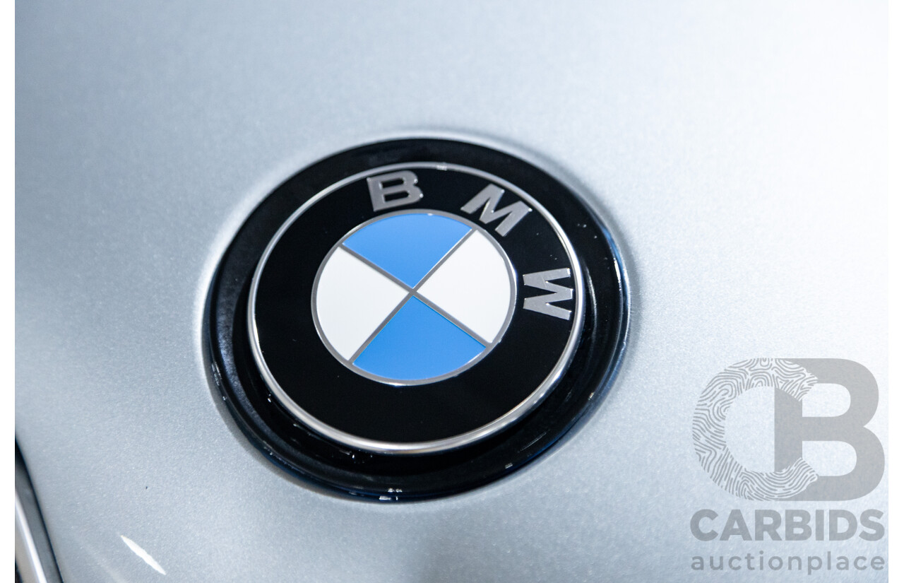 7/2016 BMW i8 Hybrid I12 (AWD) 2d Coupe Iconic Silver Metallic Turbo 1.5L