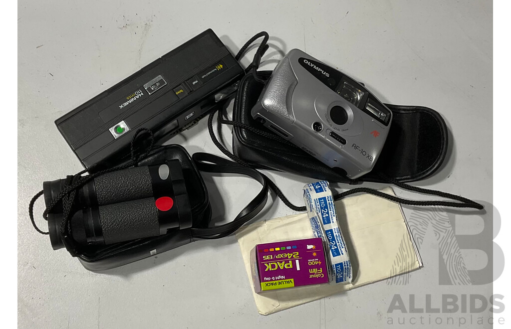 Olympus AF- 10 XB Camera with Instructions Alongside a Hanimex Camera and Original Film