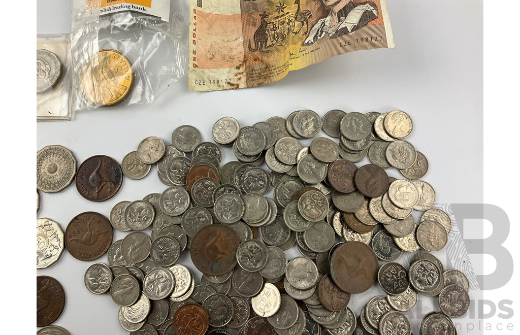 Collection of Australian Currency Including Commemorative Fifty Cent Coins, 1946 Florin, 1977 One Dollar Note, 1988 Five Dollar Coin and More