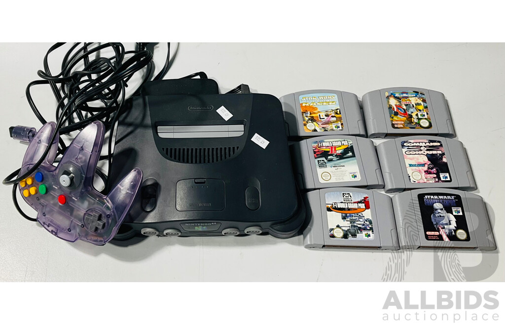 Nintendo64 Alongside One Controller and Six Game Cartridges Including Star Wars and F-1 World Grand Prix