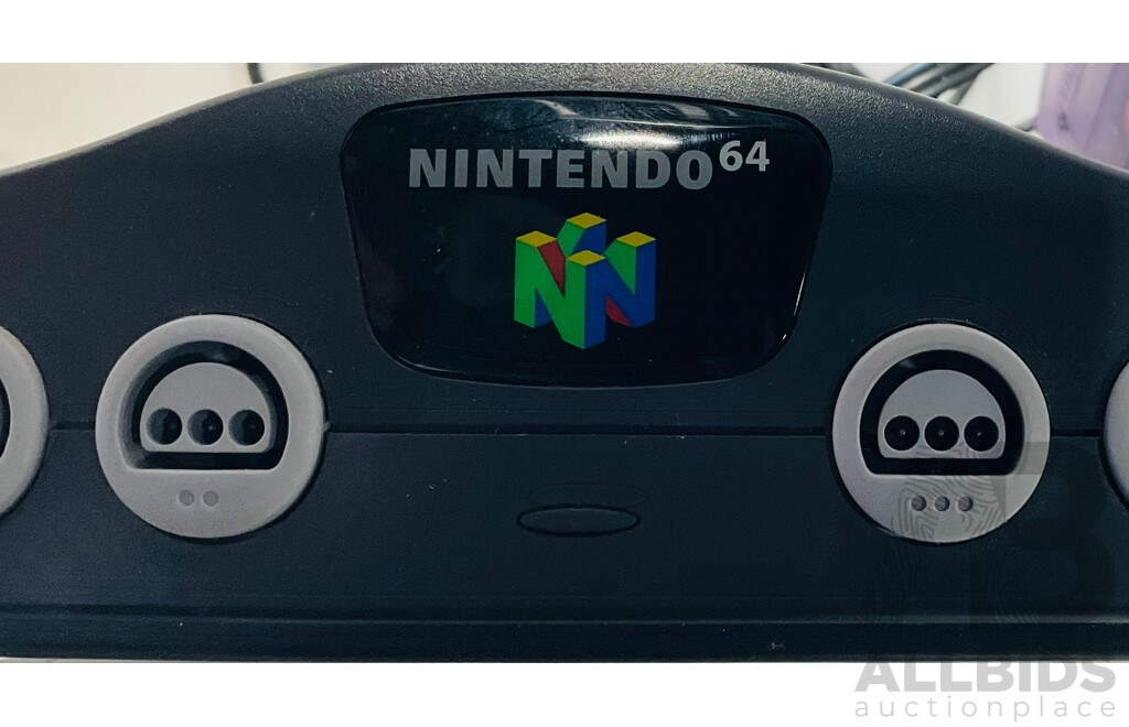 Nintendo64 Alongside One Controller and Six Game Cartridges Including Star Wars and F-1 World Grand Prix