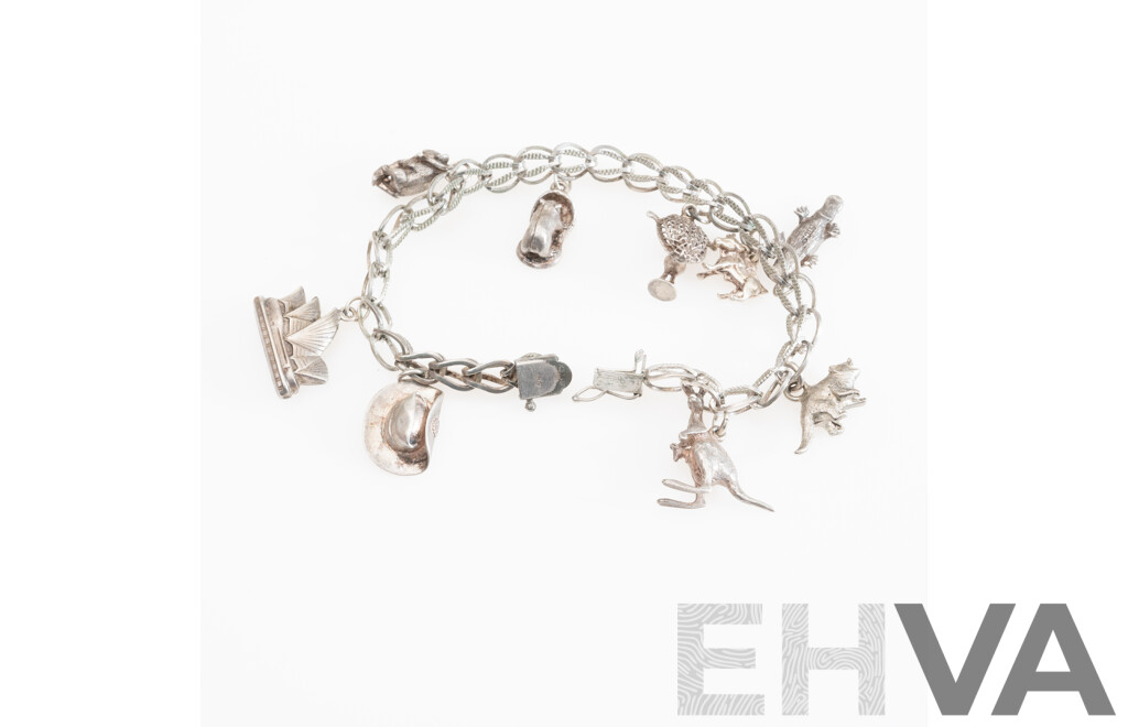 Vintage Sterling Silver Fancy Link Australiana Charm Bracelet with (9) Vintage Charms Including Sydney Opera House, 22cm, 34.41 Grams
