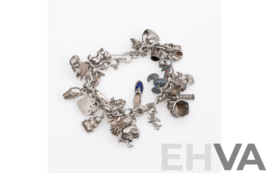 Vintage Sterling Silver Charm Bracelet Laden with (24) Vintage Charms, 20cm Long, 79.65 Grams