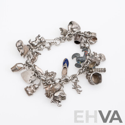 Vintage Sterling Silver Charm Bracelet Laden with (24) Vintage Charms, 20cm Long, 79.65 Grams