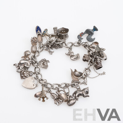 Vintage Sterling Silver Charm Bracelet Laden with (24) Vintage Charms, 20cm Long, 79.65 Grams