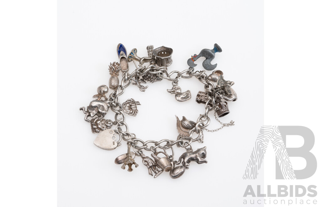 Vintage Sterling Silver Charm Bracelet Laden with (24) Vintage Charms, 20cm Long, 79.65 Grams