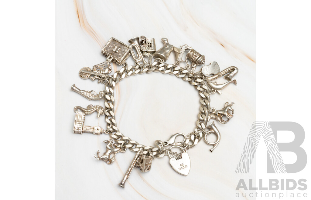 Vintage Sterling Silver Flat Curb Link Bracelet with Heart Padlock & (19) Vintage Sterling Silver Charms, 78.05 Grams