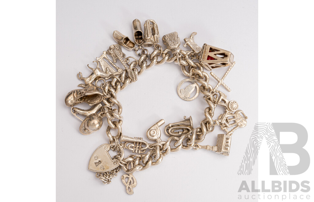 Vintage Sterling Silver Curb Link Padlock Bracelet with (19) Vintage Sterling Silver Charms, 62 Grams