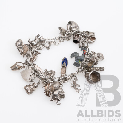 Vintage Sterling Silver Charm Bracelet Laden with (24) Vintage Charms, 20cm Long, 79.65 Grams