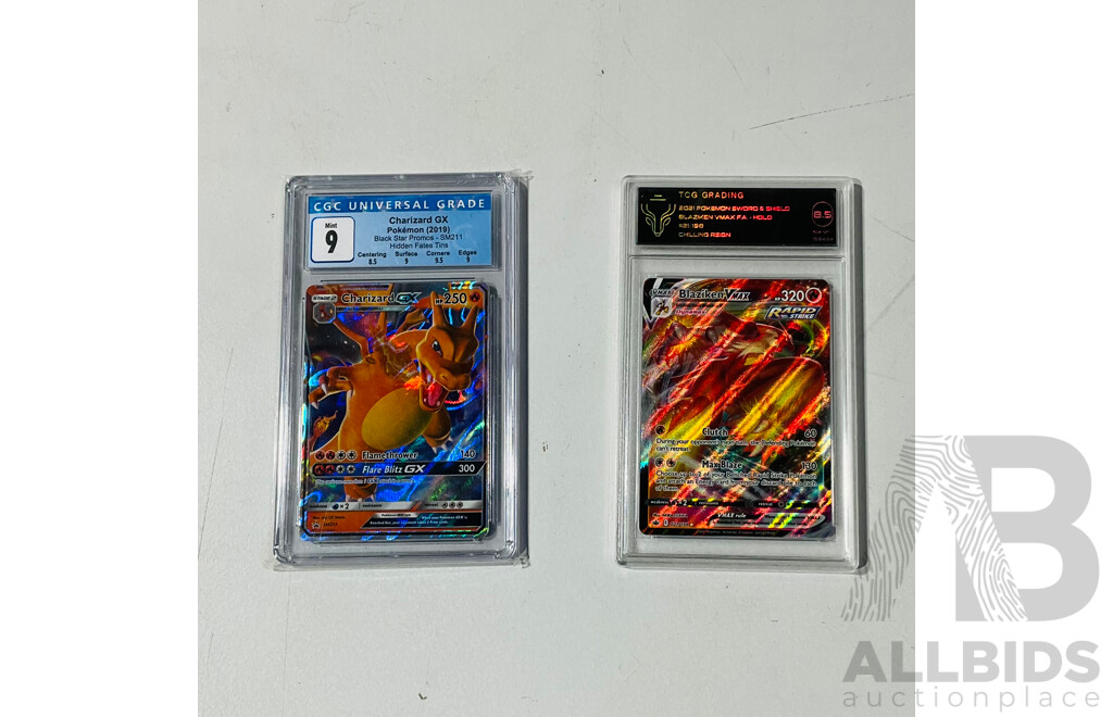 Pokemon TCG 2019 Black Star Promos Charizard GX #SM211 - PSA 9 and Pokémon TCG 2021 Blaziken VMAX #21/198 - PSA 8.5