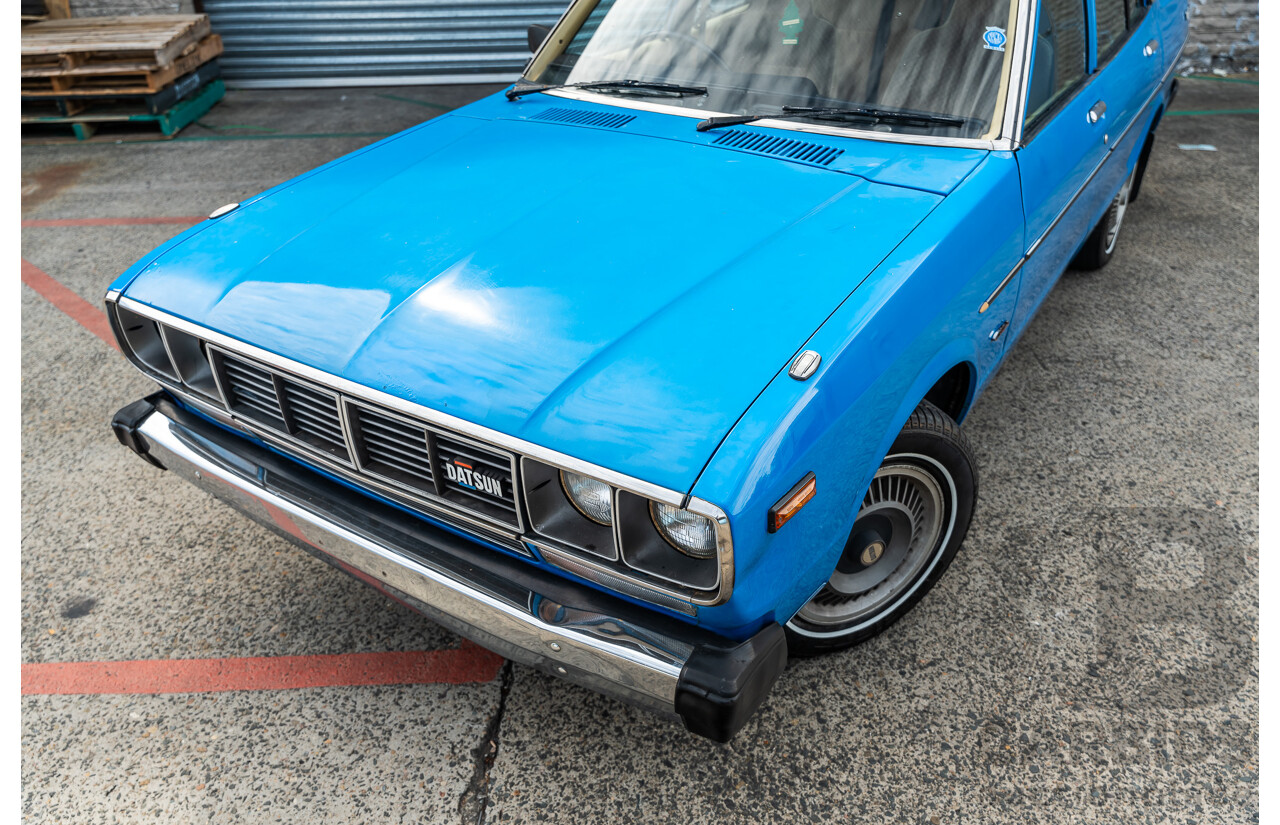 8/1980 Datsun 200b GL 810 4d Wagon Blue 2.0L