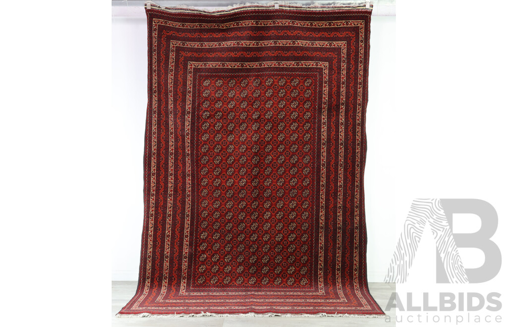 Hand Knotted Afghan Wool Carpet with Classic Gul Design with Rich Red Colouration