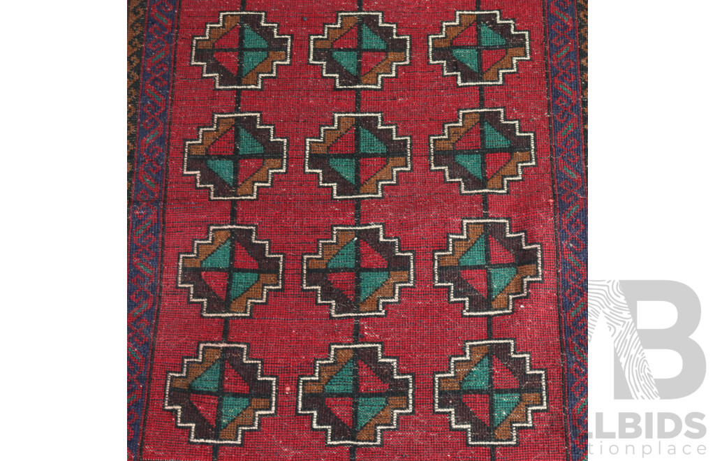 Hand Knotted Afghan Baluchi Wool Rug with Subdued Colouration