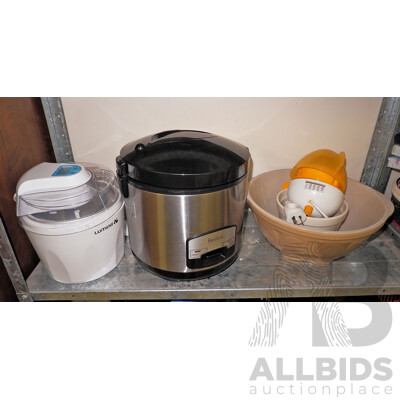 Shelf of Kitchen Appliances Including Rice Cooker, Mixing Bowl Etc. as Shown in the Photo