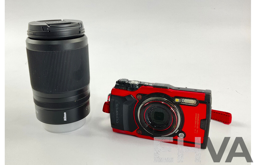 Olympus Tough F2.0 Digital Camera and Nikkon/Nikkor DX 50-25/4.5-6.3 Camera Lens