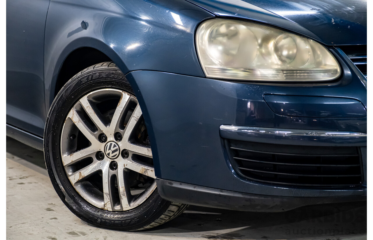 2/2007 Volkswagen Jetta 2.0 TDI 1KM 4d Sedan Metallic Blue Turbo Diesel 2.0L