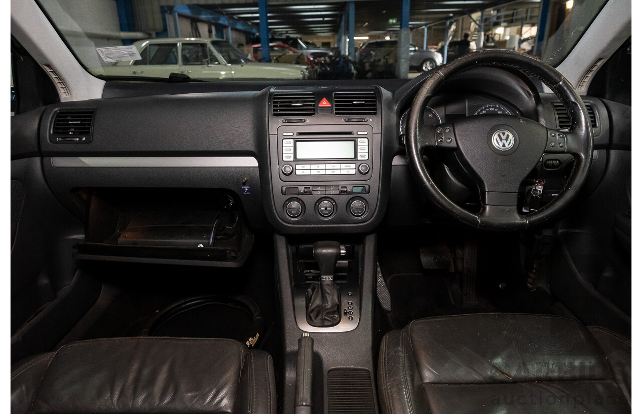 2/2007 Volkswagen Jetta 2.0 TDI 1KM 4d Sedan Metallic Blue Turbo Diesel 2.0L